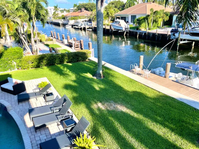 a view of swimming pool with outdoor seating
