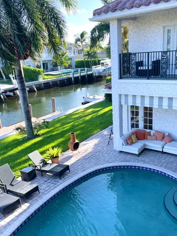 a view of a lake with a house