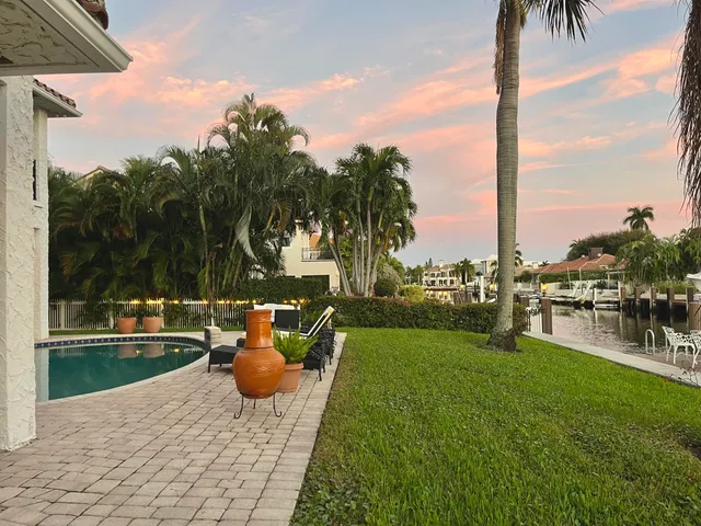 a view of swimming pool with seating space