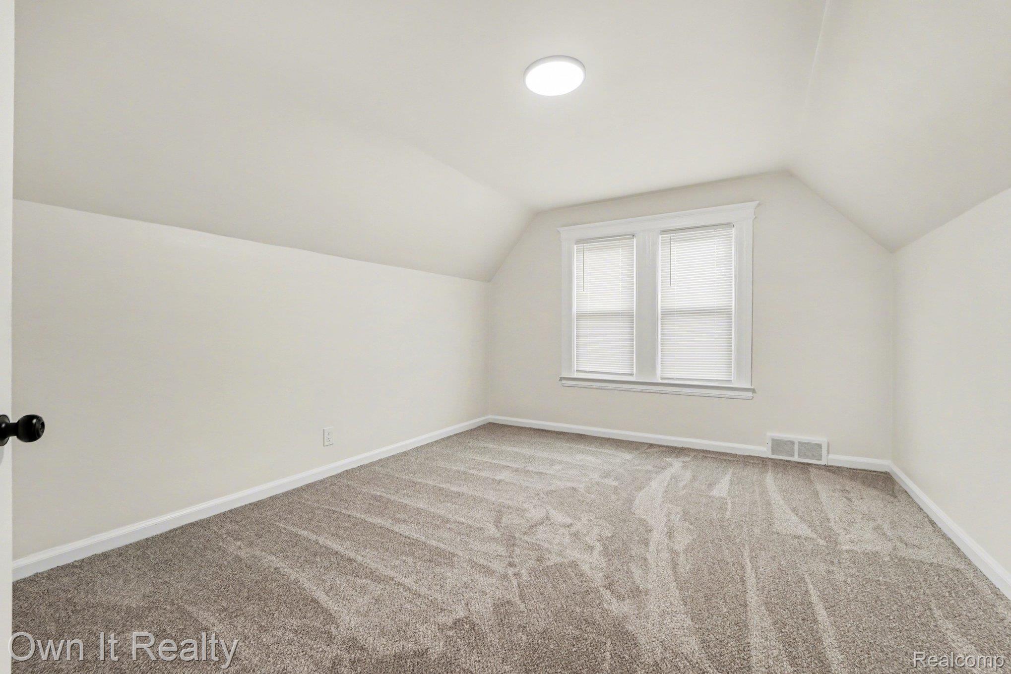 168 Kerby Road Grosse Pointe, MI 48236 - Photo 19 of 36 Additional living space featuring light colored carpet and baseboards