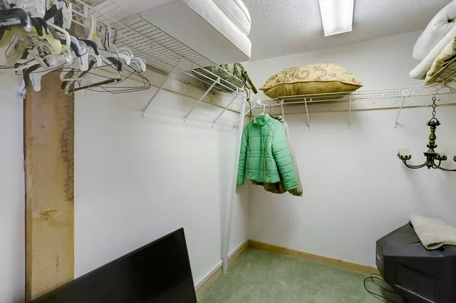 a view of a room with racks on the wall