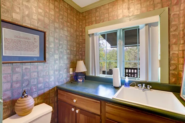 a kitchen with a sink and a window