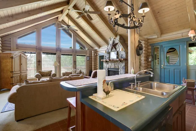 a room with gym equipment and a large window