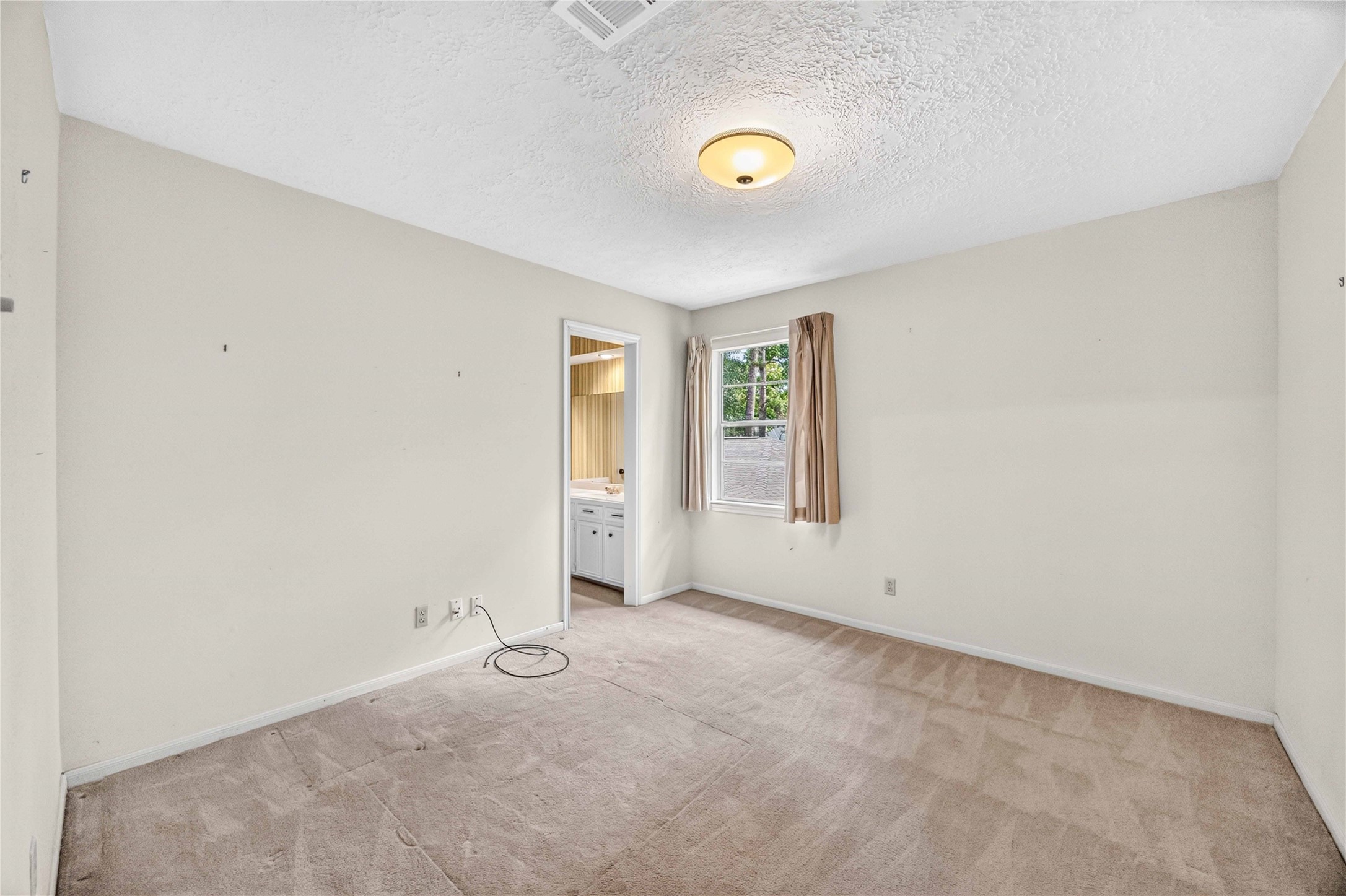 6302 Meadowtrace Drive Spring, TX 77389 - Photo 23 of 35 Bedroom 3 offers generous room size, an oversized closet and its own private vanity area.