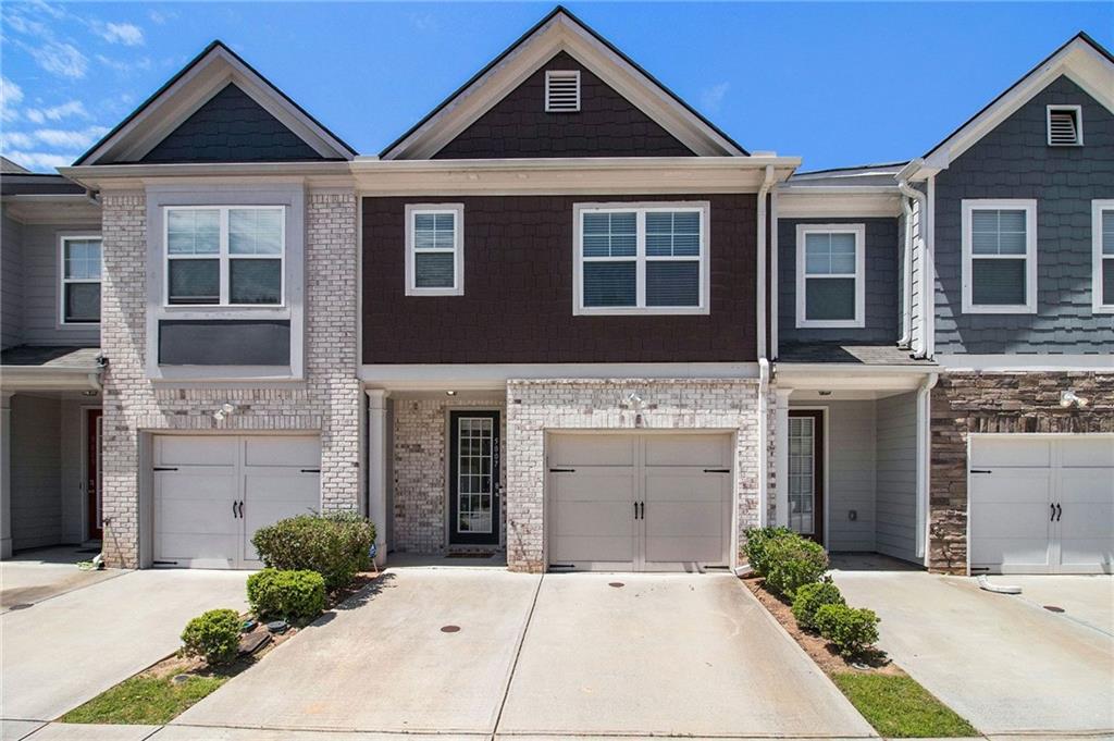 5007 Longview Walk Decatur, GA 30035 - Photo 1 of 1 a front view of a house with a yard