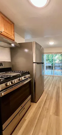 a bathroom with a sink toilet and a mirror