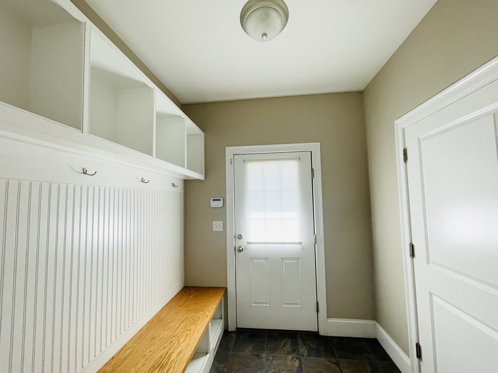 127 Lowell Street Lexington, MA 02420 - Photo 11 of 33 a view of a hallway with closet