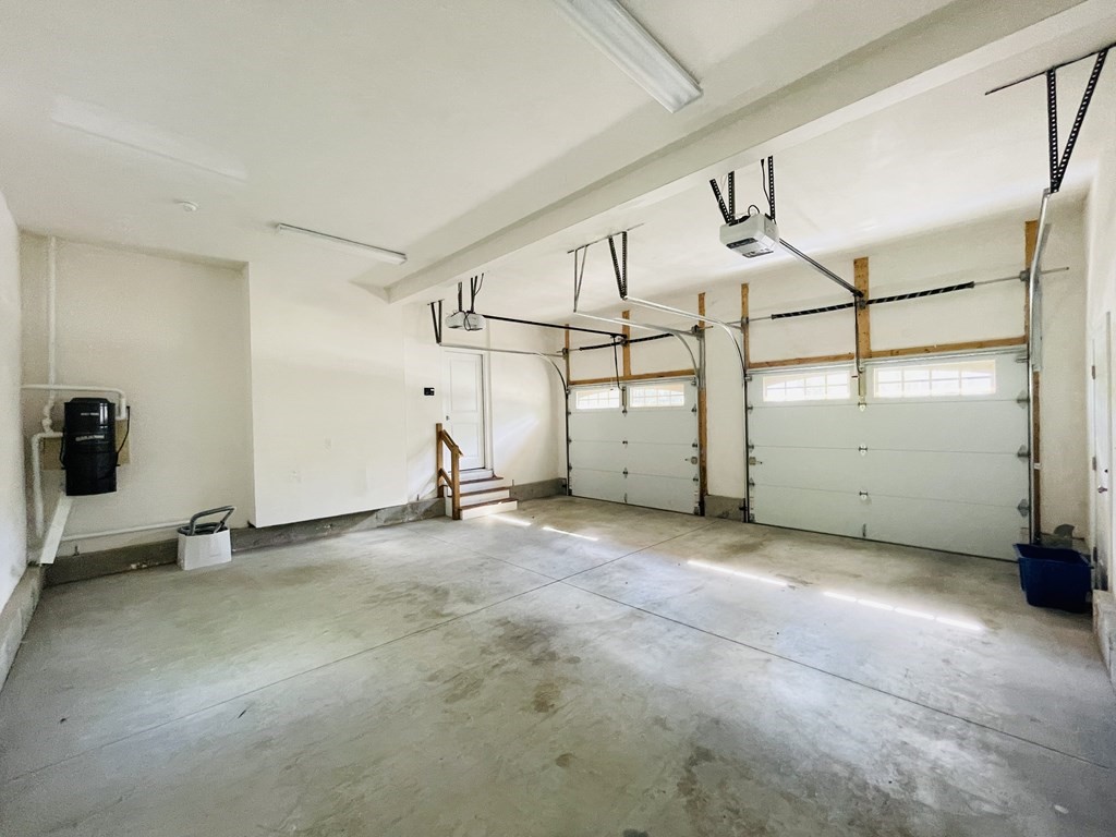 127 Lowell Street Lexington, MA 02420 - Photo 12 of 33 an empty room with windows