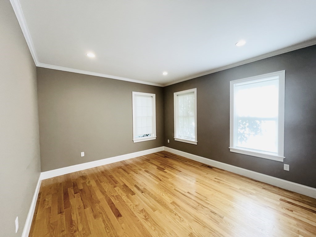 127 Lowell Street Lexington, MA 02420 - Photo 6 of 33 a view of an empty room and window