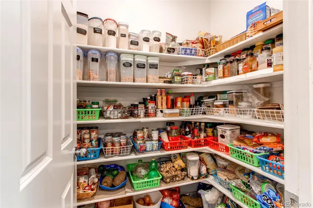 a room with lots of different kinds of food