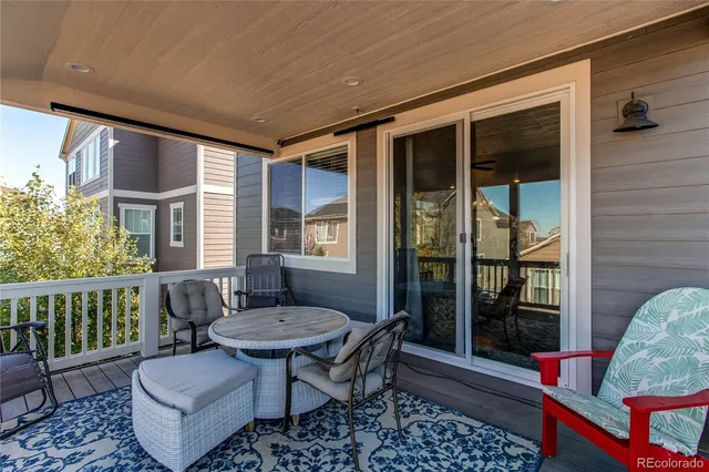 a outdoor living space with furniture and a potted plant