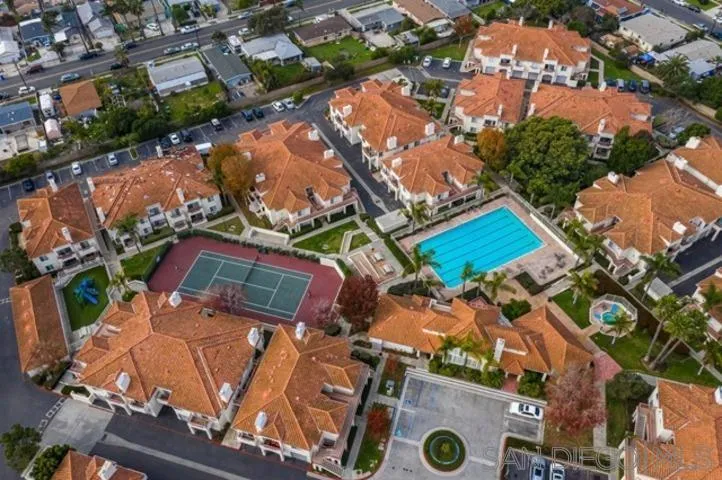 an aerial view of a house with a ocean view
