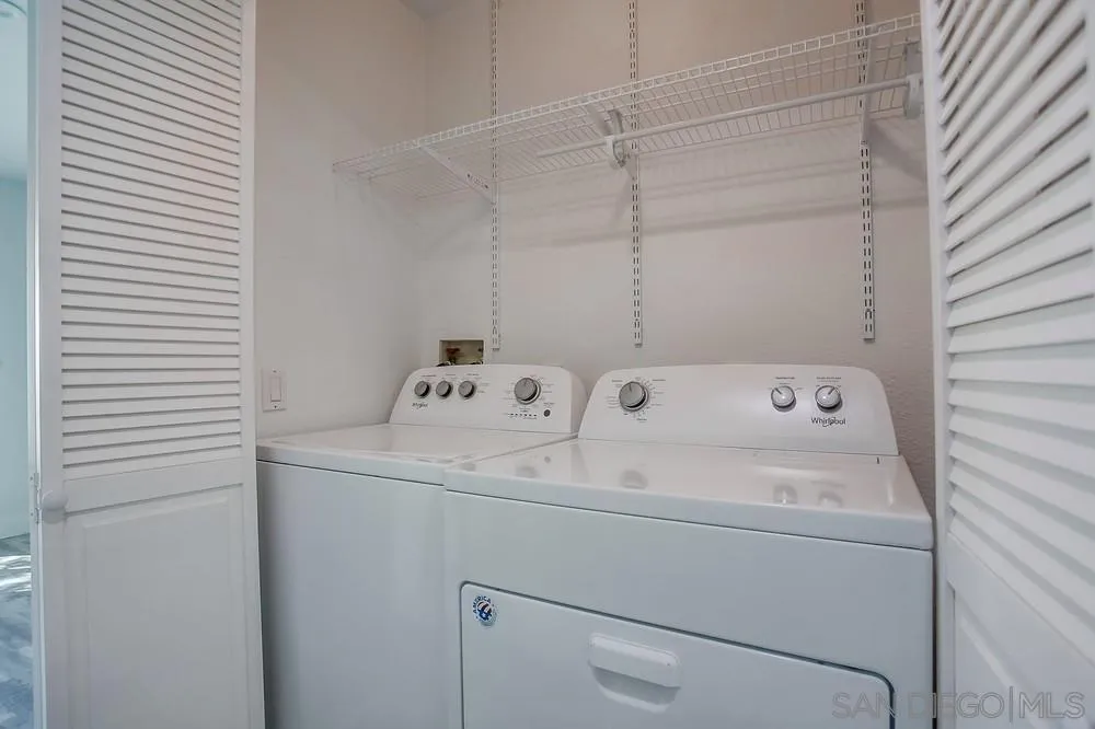 450 Stoney Point Way, Unit 135 Oceanside, CA 92058 - Photo 28 of 38 a utility room with dryer and washer