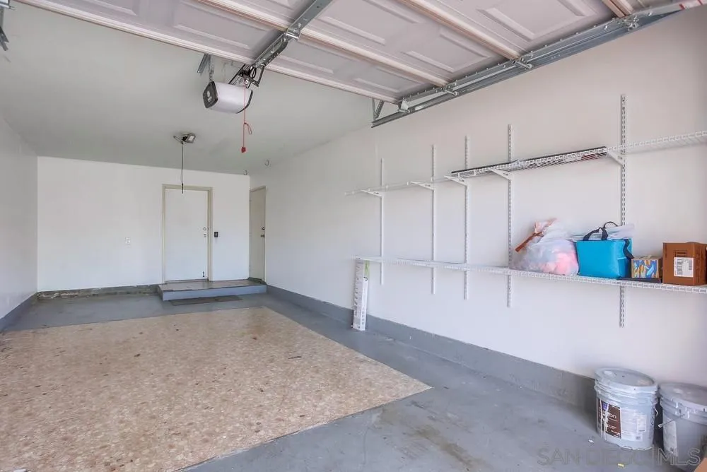 450 Stoney Point Way, Unit 135 Oceanside, CA 92058 - Photo 35 of 38 a view of a room with racks on the wall