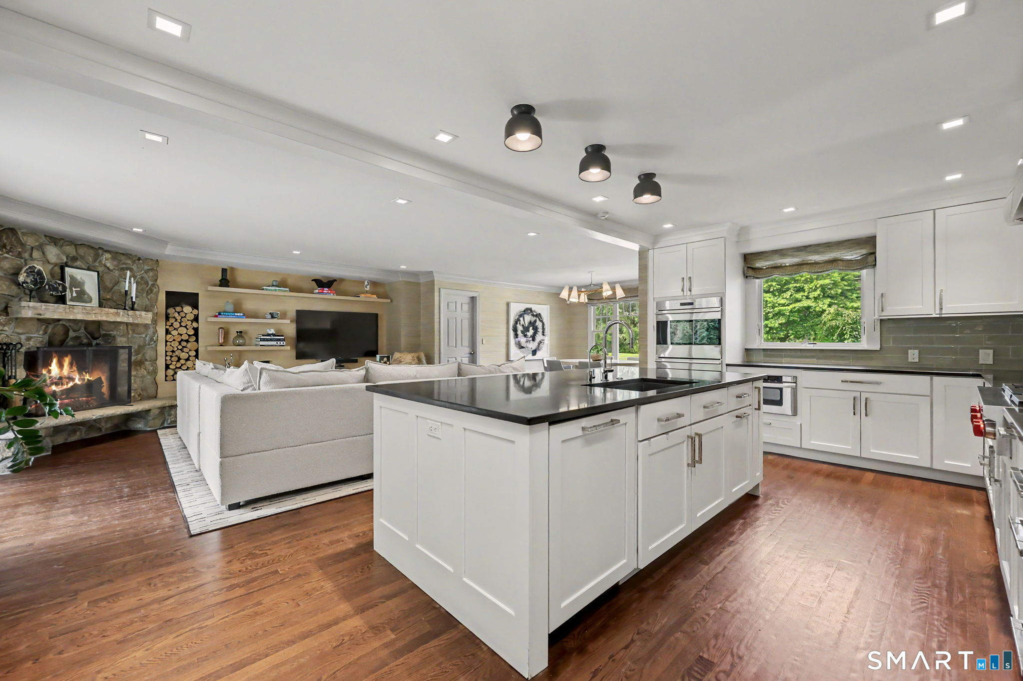 18 West Meadow Road Wilton, CT 06897 - Photo 12 of 40 Large Center Island with seating. Open to Family Room and Breakfast Nook