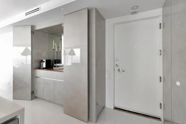 a view of a refrigerator in a kitchen
