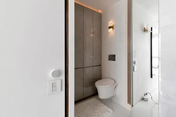 a spacious bathroom with a bathtub and shower