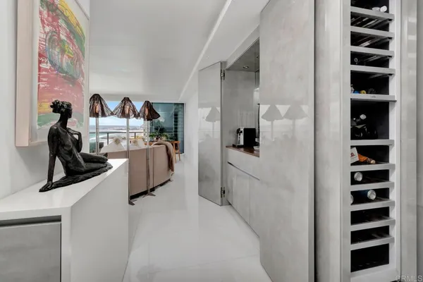 a view of a living room with workspace and window