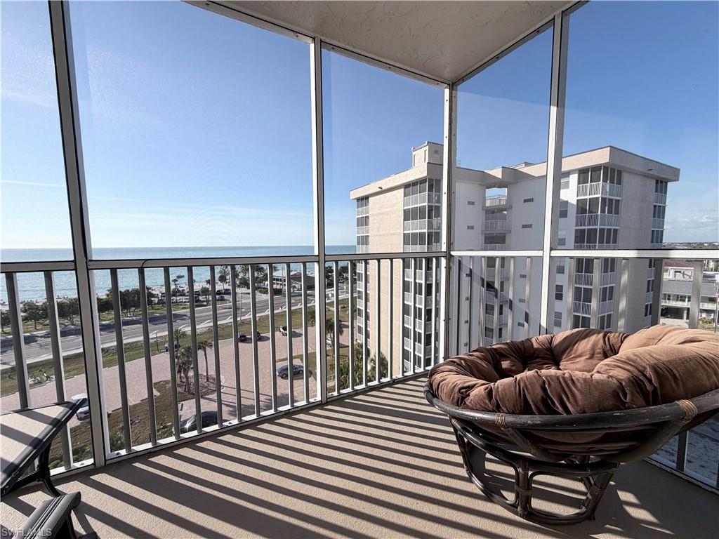 5800 Bonita Beach Road Southwest, Unit 2805 Bonita Springs, FL 34134 - Photo 19 of 30 Balcony featuring a sunroom