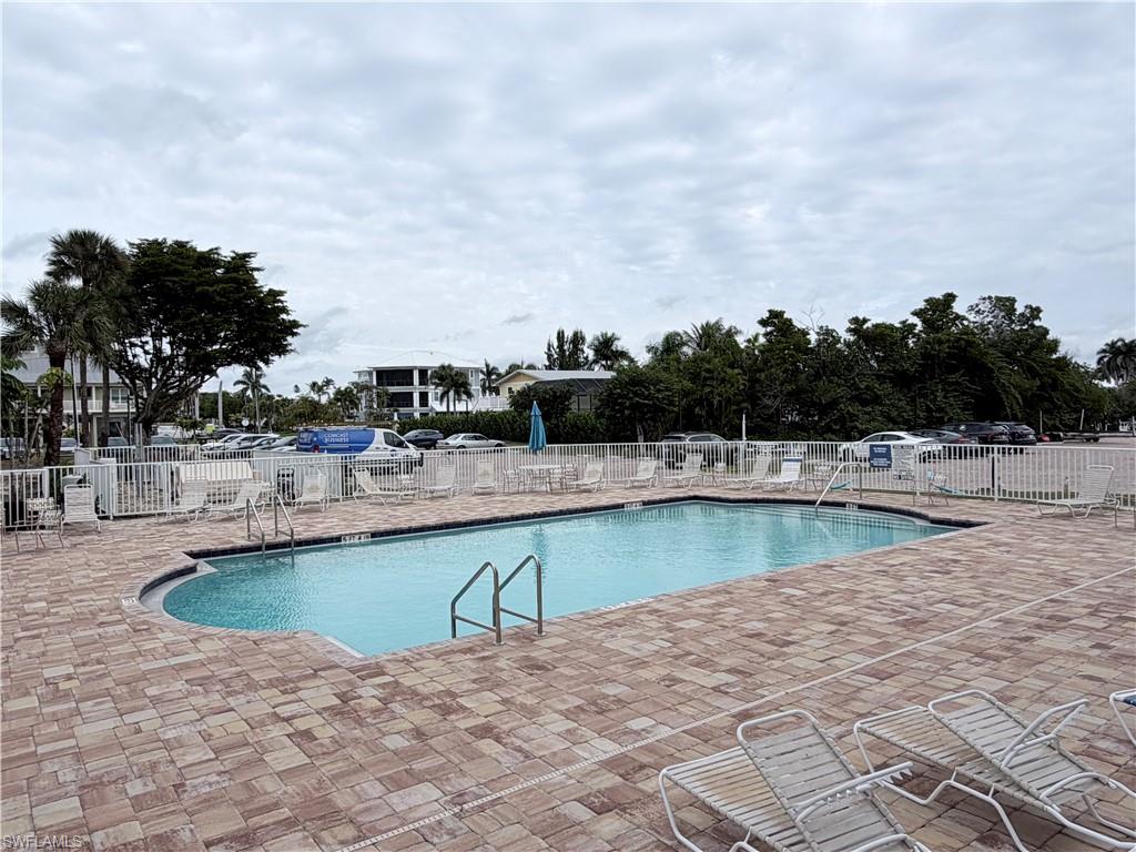 5800 Bonita Beach Road Southwest, Unit 2805 Bonita Springs, FL 34134 - Photo 23 of 30 Community pool featuring a patio area