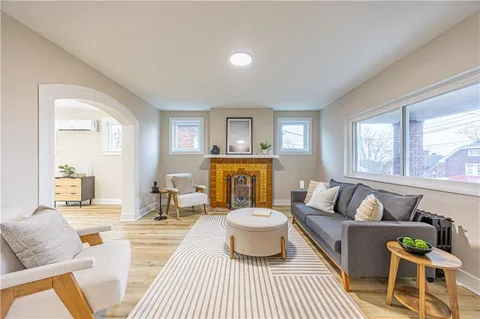 a living room with furniture and a couch