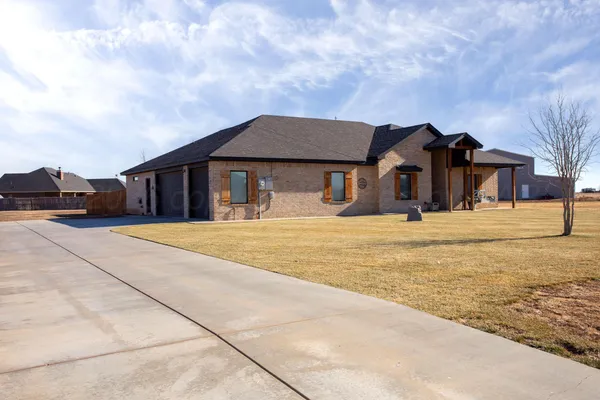 a front view of house with yard