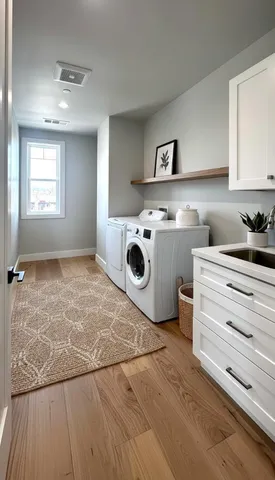 a view of a kitchen with a stove cabinets and a wooden floor
