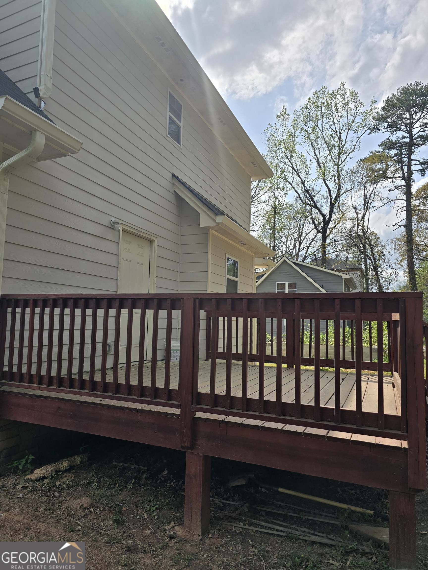 4075 Fairburn Avenue Southwest Atlanta, GA 30331 - Photo 2 of 12 a porch with a bench