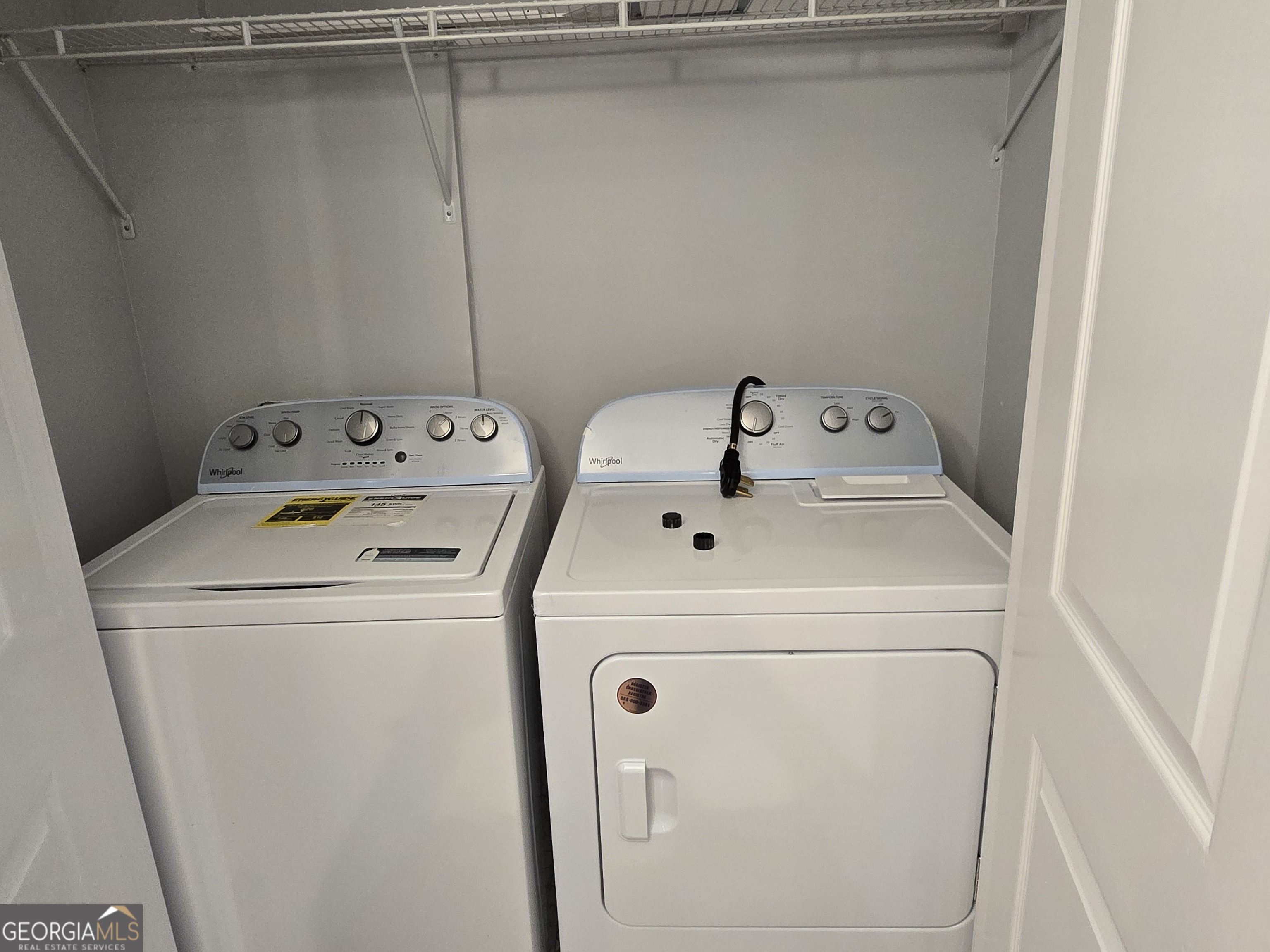 4075 Fairburn Avenue Southwest Atlanta, GA 30331 - Photo 6 of 12 a utility room with dryer and washer