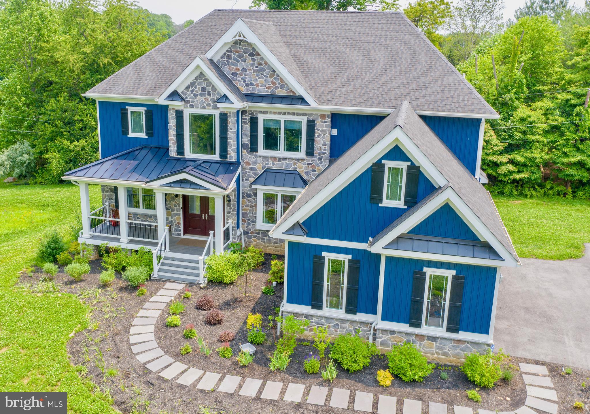 64 B Kirk Road Garnet Valley, PA 19060 - Photo 9 of 37 a front view of a house with garden