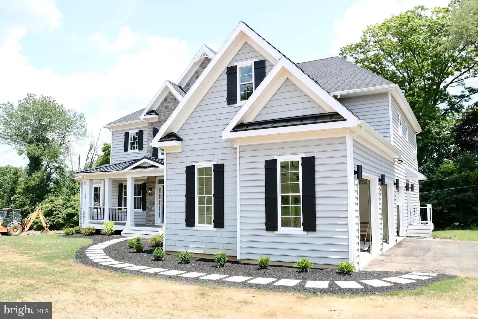 64 B Kirk Road Garnet Valley, PA 19060 - Photo 10 of 37 a front view of a house with garden