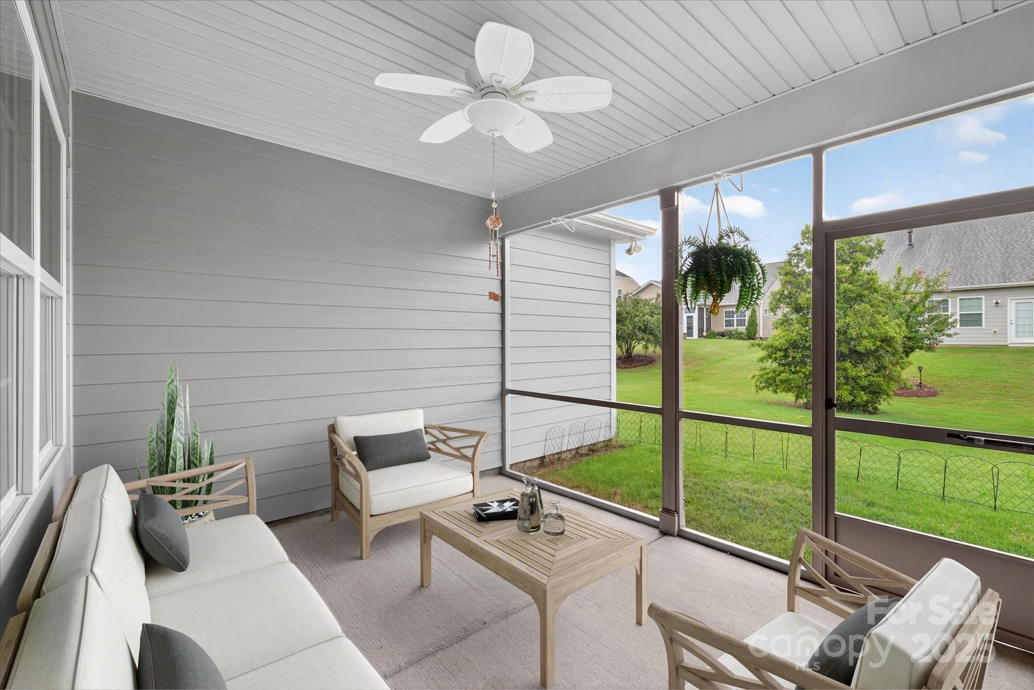 4057 Channel Islands Way Lancaster, SC 29720 - Photo 9 of 34 a balcony with furniture and a potted plant