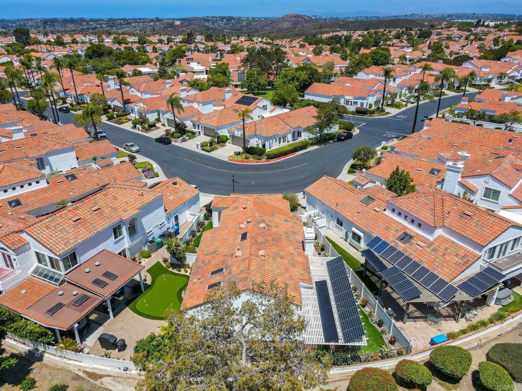 4939 Tilos Way Oceanside, CA 92056 - Photo 34 of 49 an aerial view of residential houses with outdoor space