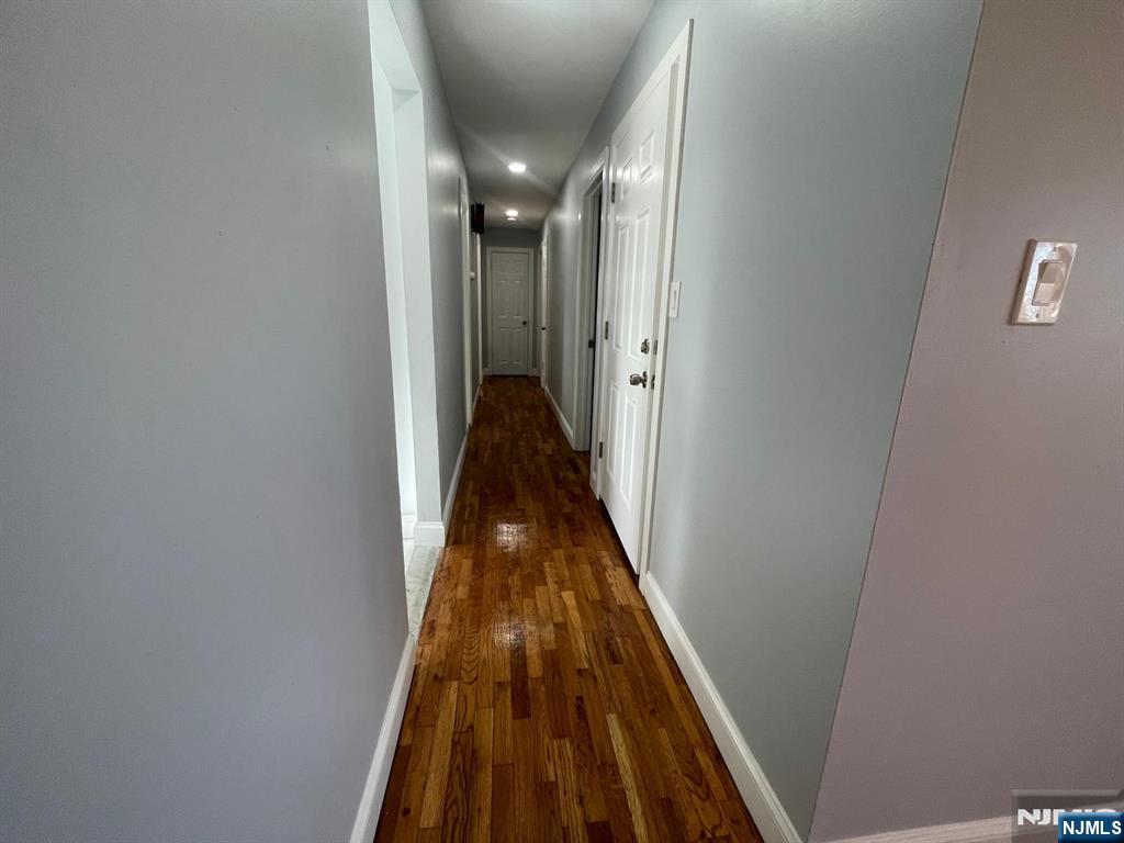 85 Grove Street, Unit 1 South Hackensack, NJ 07606 - Photo 4 of 9 wooden floor in a gallery