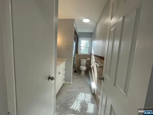 a view of a hallway with entryway