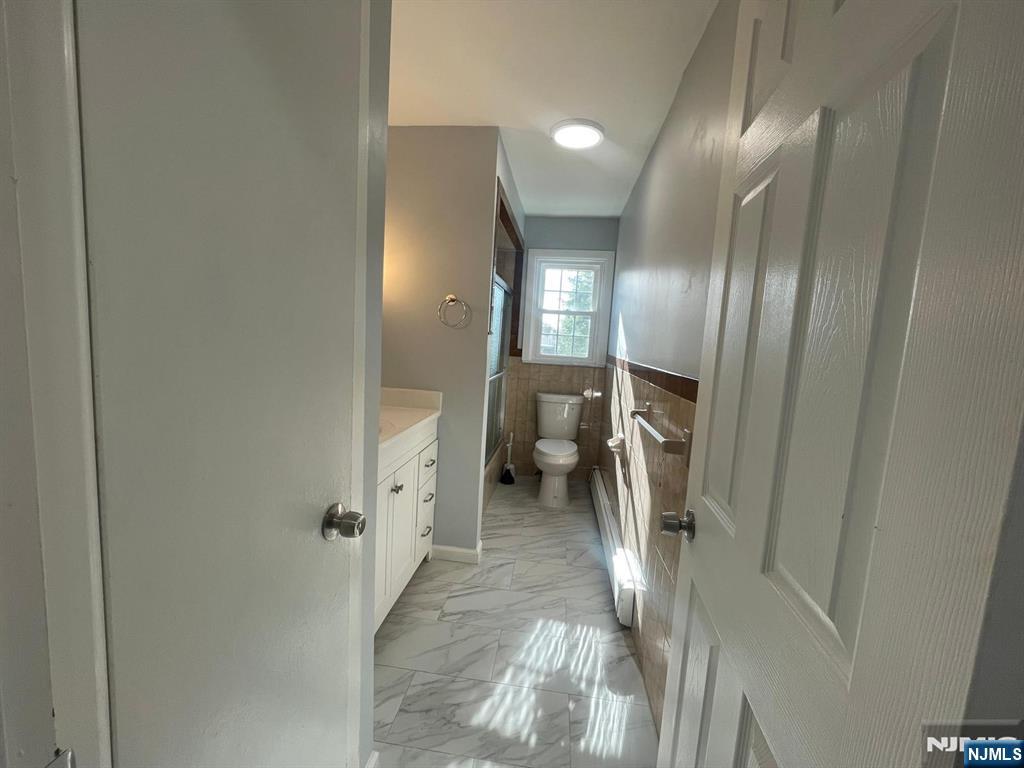 85 Grove Street, Unit 1 South Hackensack, NJ 07606 - Photo 9 of 9 a view of a hallway with entryway