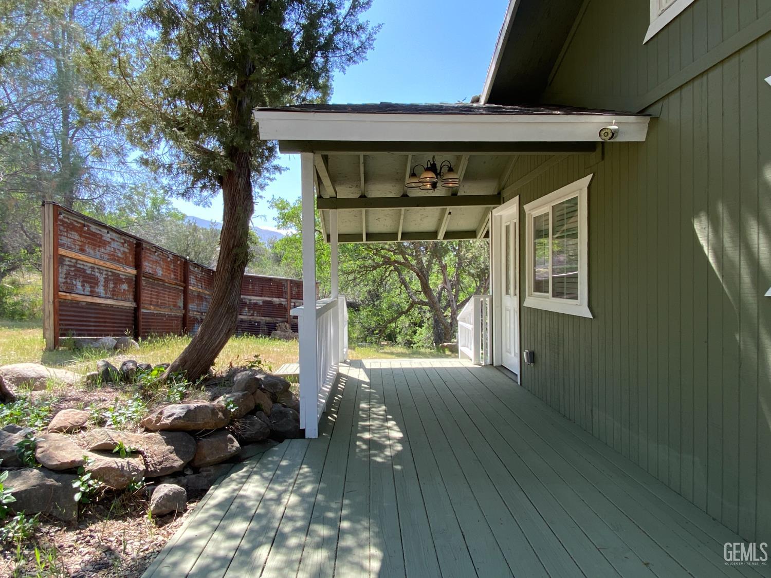 Undisclosed Address Caliente, CA 93518 - Photo 5 of 33 a front view of a house with garden
