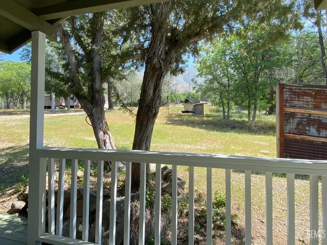 a view of swimming pool from a balcony