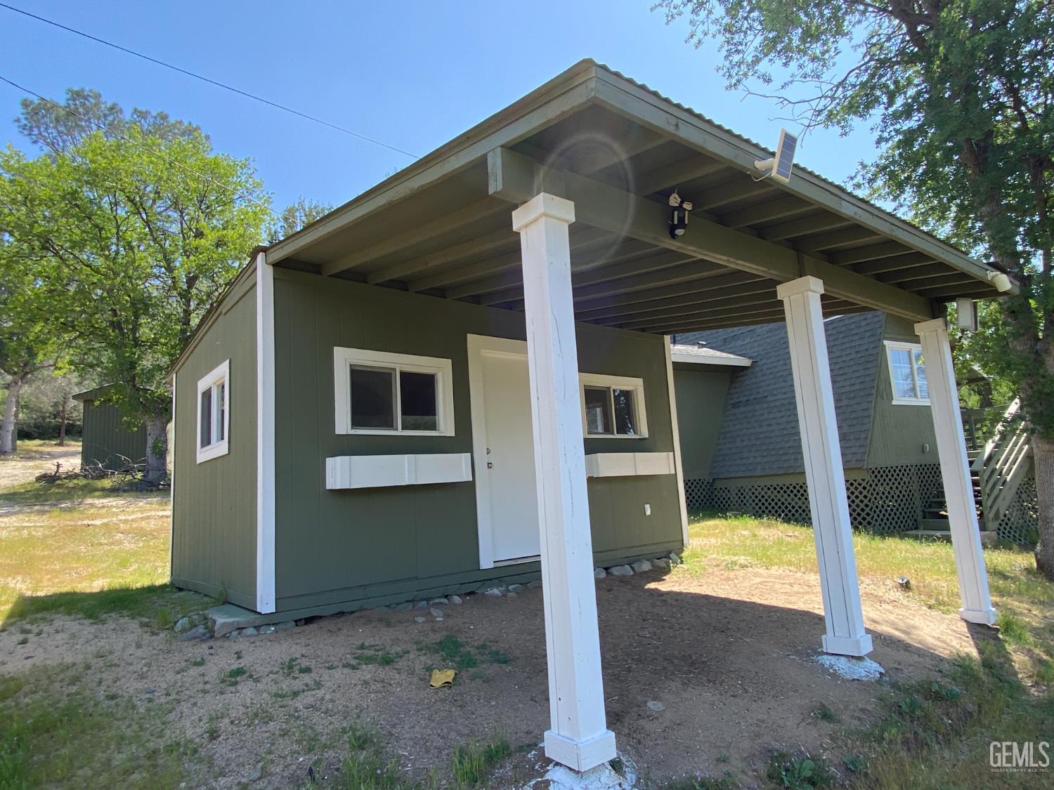 Undisclosed Address Caliente, CA 93518 - Photo 8 of 33 a front view of house with yard