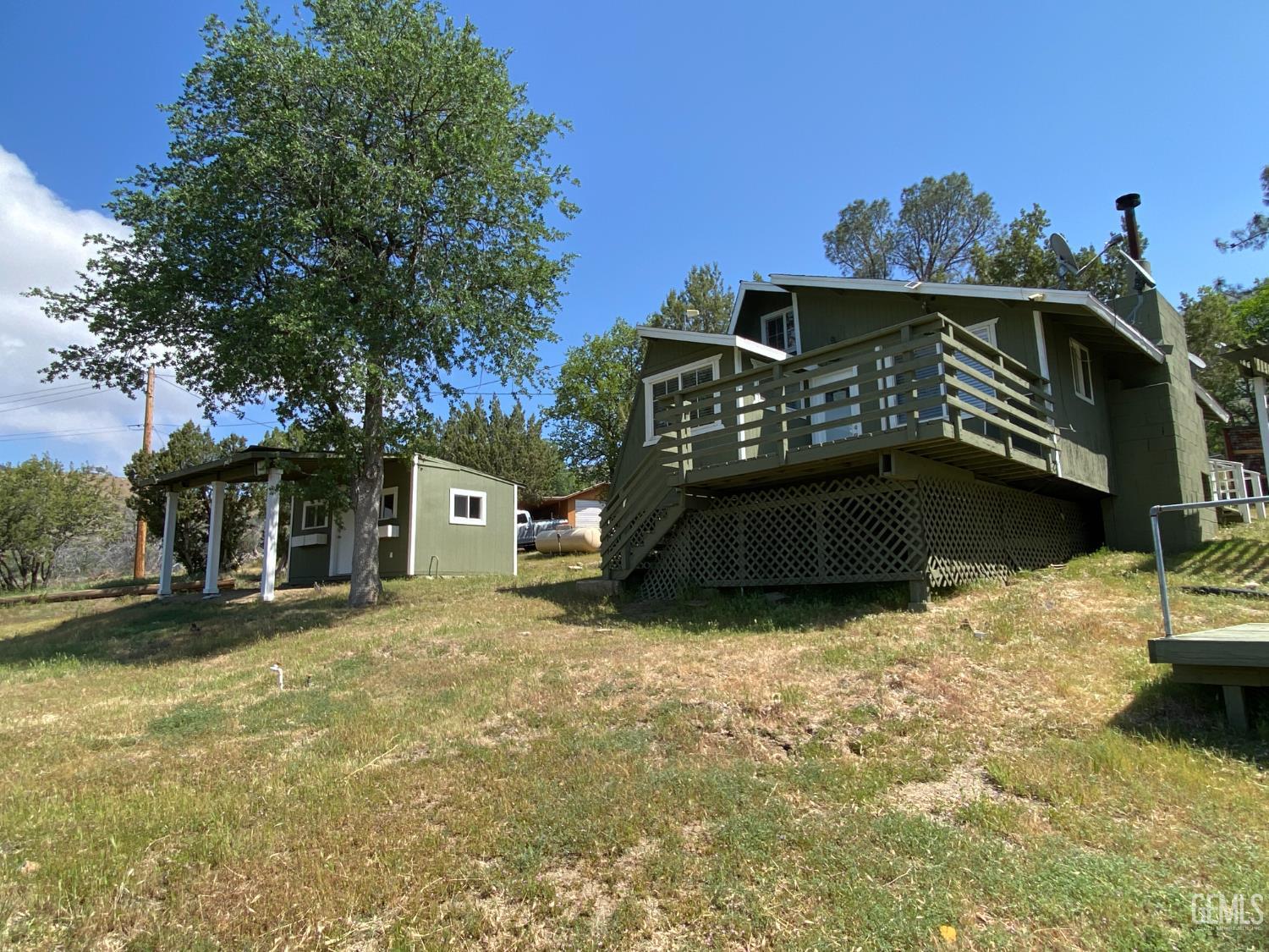 Undisclosed Address Caliente, CA 93518 - Photo 10 of 33 a view of a house with a yard