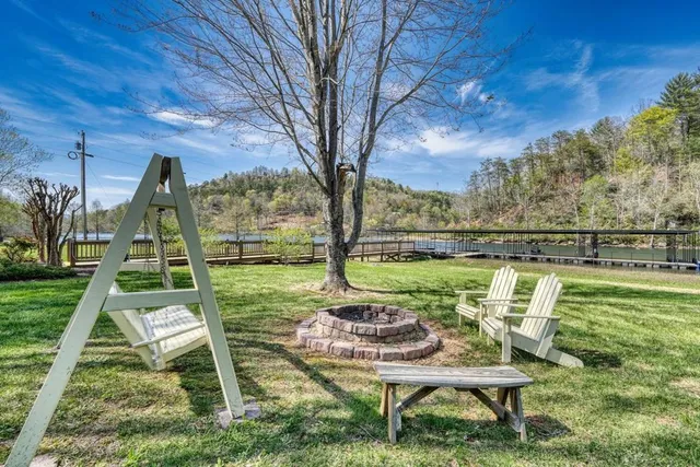 a bathroom with double vanity and a mirror