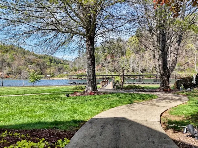 a bed room with furniture and a chandelier
