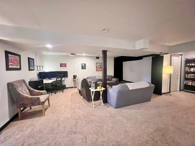 a living room with furniture and a couch