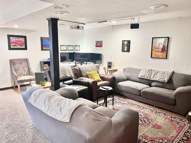 a living room with furniture and a couch