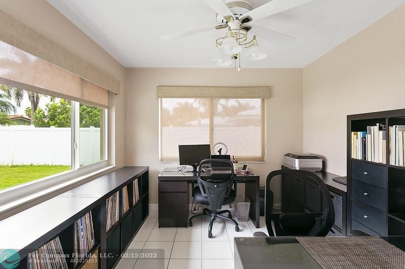 1948 Sailfish Place Lauderdale-by-the-Sea, FL 33062 - Photo 12 of 33 a view of a workspace with furniture and a window