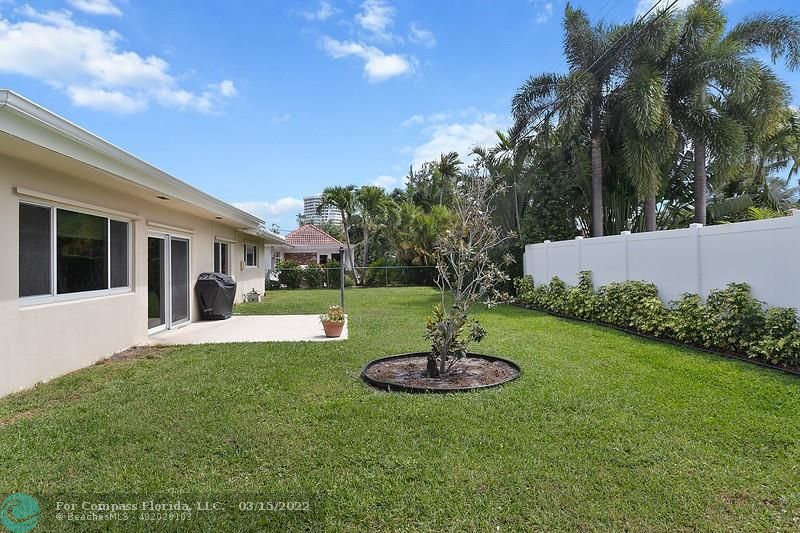 1948 Sailfish Place Lauderdale-by-the-Sea, FL 33062 - Photo 19 of 33 a view of a house with a yard