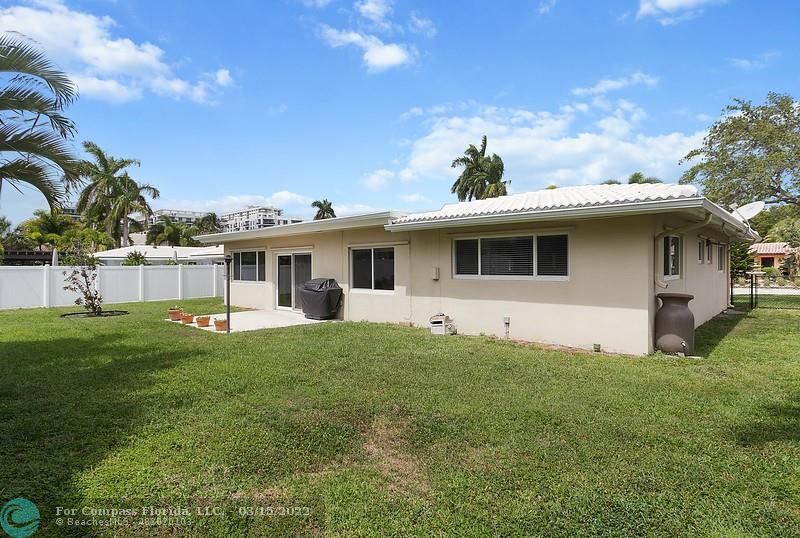 1948 Sailfish Place Lauderdale-by-the-Sea, FL 33062 - Photo 20 of 33 a front view of a house with a garden
