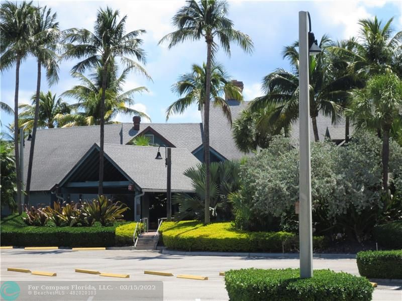 1948 Sailfish Place Lauderdale-by-the-Sea, FL 33062 - Photo 31 of 33 a front view of a house with swimming pool