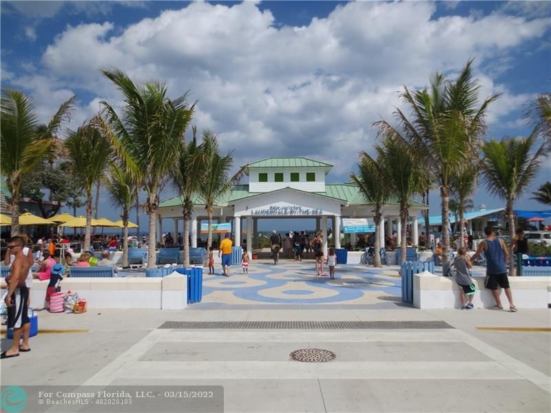 1948 Sailfish Place Lauderdale-by-the-Sea, FL 33062 - Photo 33 of 33 a group of people walking down a street