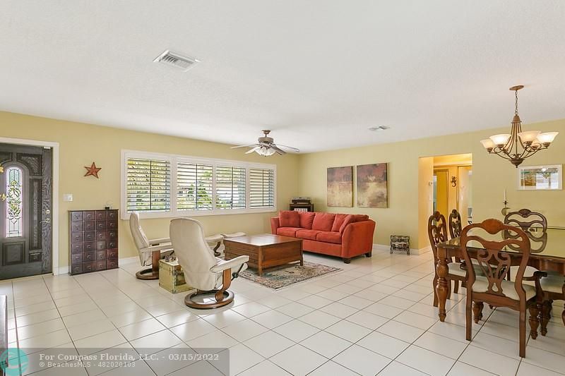 1948 Sailfish Place Lauderdale-by-the-Sea, FL 33062 - Photo 5 of 33 a living room with furniture